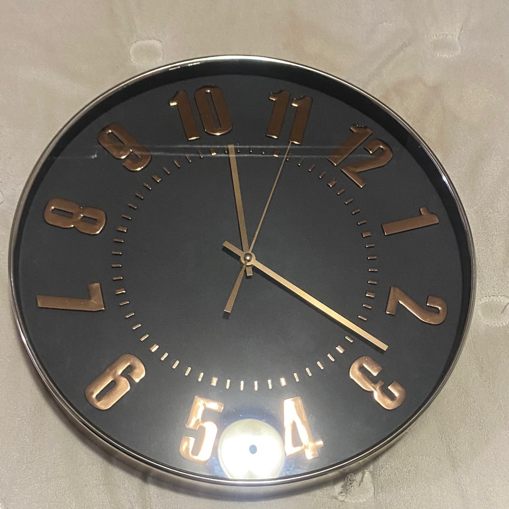 Elegant Black and Gold Wall Clock